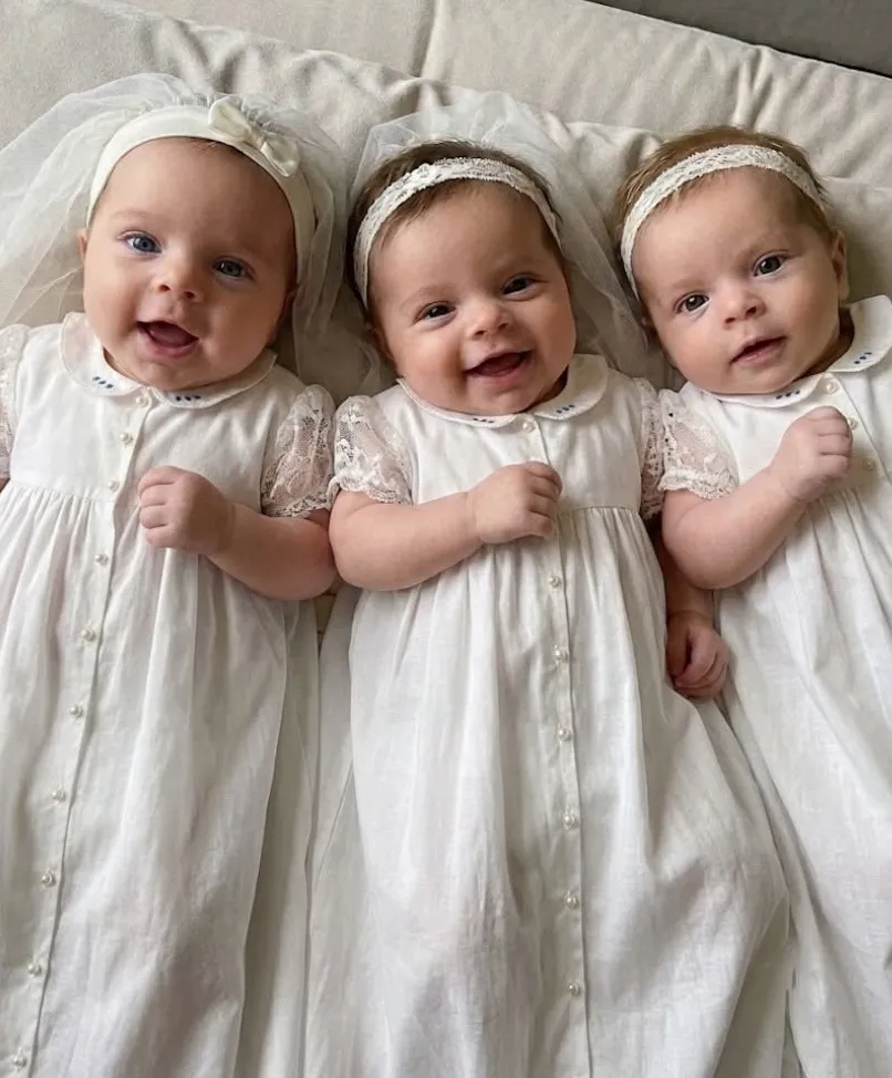 Tiny wedding dresses for triplets